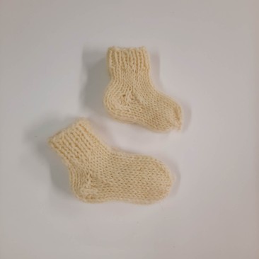 Vilnonės kojinės naujagimiui - baltos